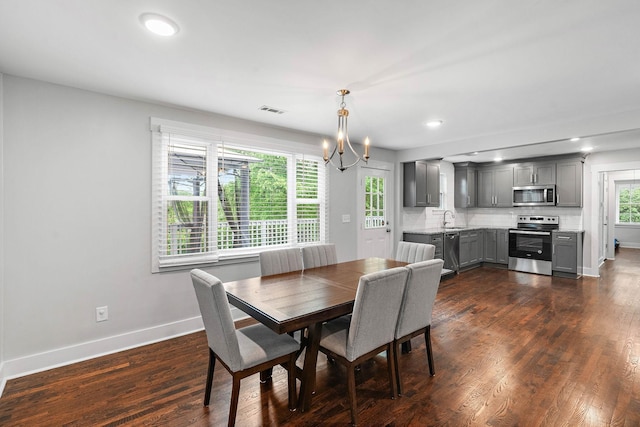 129 Neese Dr, Nashville, TN 37211 - dining room with a chandelier, baseboards, dark wood-style floors, and recessed lighting