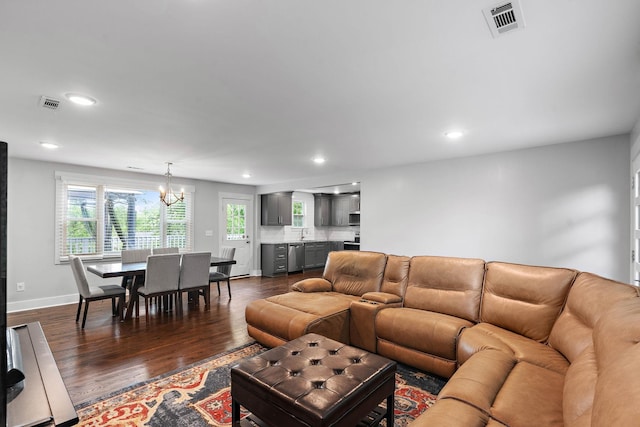 129 Neese Dr, Nashville, TN 37211 - living room with dark wood-style flooring, a chandelier, recessed lighting, and baseboards