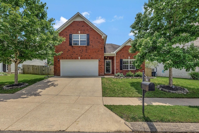 4047 Locerbie Cir, Spring Hill, TN 37174 - traditional-style house with brick siding, driveway, and a garage
