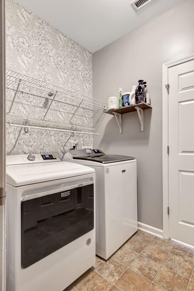 4047 Locerbie Cir, Spring Hill, TN 37174 - laundry room with independent washer and dryer and baseboards