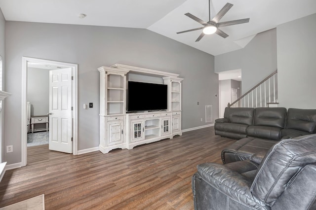 4047 Locerbie Cir, Spring Hill, TN 37174 - living area with a ceiling fan, lofted ceiling, dark wood-style floors, and stairs