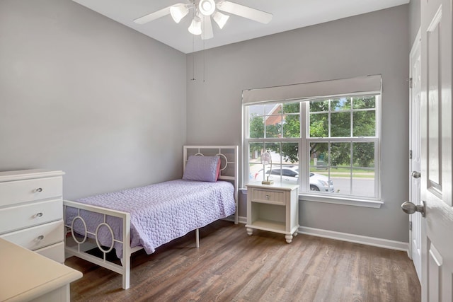 4047 Locerbie Cir, Spring Hill, TN 37174 - bedroom with wood finished floors and a ceiling fan