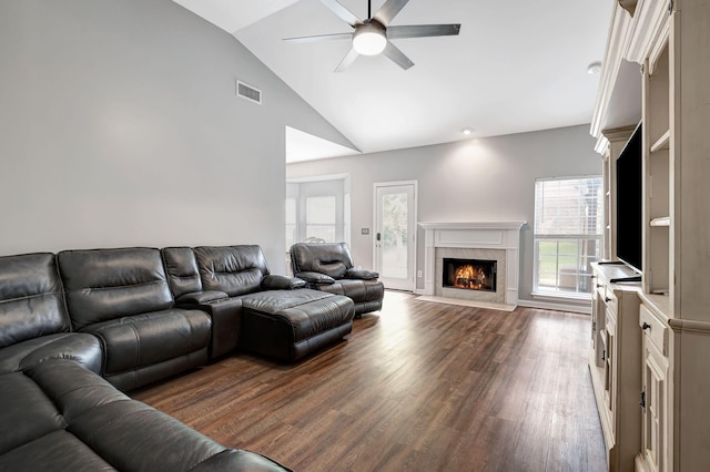 4047 Locerbie Cir, Spring Hill, TN 37174 - living room featuring lofted ceiling, a ceiling fan, dark wood-style floors, and a high end fireplace
