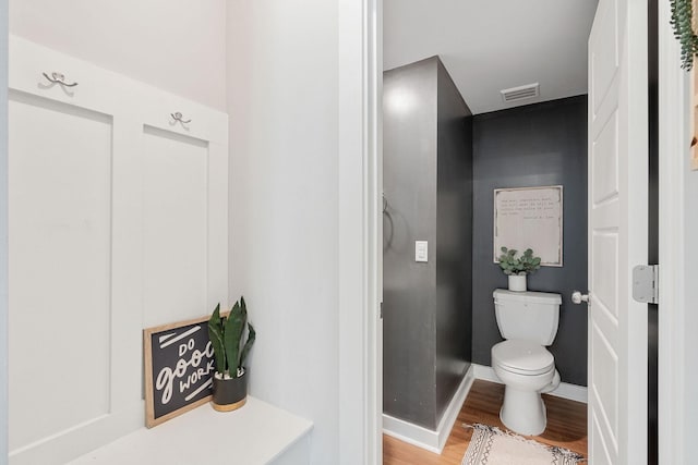 417 Irwin Way, Spring Hill, TN 37174 - bathroom featuring toilet, wood finished floors, and baseboards