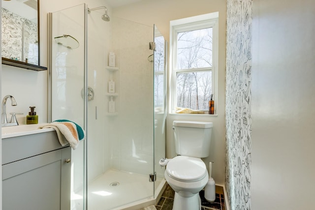 639 Piney Creek Rd, Hohenwald, TN 38462 - full bathroom with vanity, a shower stall, toilet, and baseboards