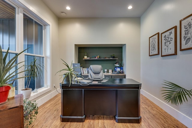 639 Piney Creek Rd, Hohenwald, TN 38462 - home office featuring light wood-type flooring, baseboards, recessed lighting, and healthy amount of natural light