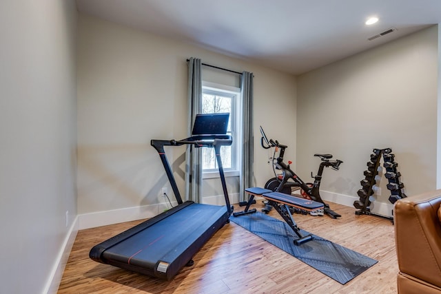 639 Piney Creek Rd, Hohenwald, TN 38462 - workout area featuring baseboards, wood finished floors, and recessed lighting