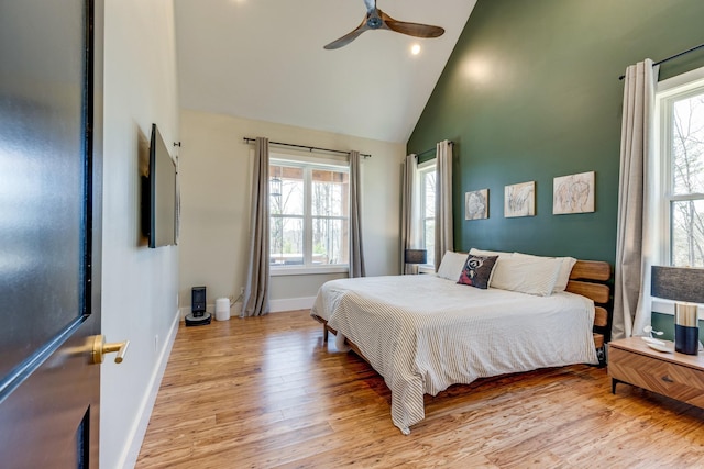 639 Piney Creek Rd, Hohenwald, TN 38462 - bedroom featuring high vaulted ceiling, wood finished floors, baseboards, and ceiling fan