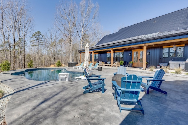 639 Piney Creek Rd, Hohenwald, TN 38462 - swimming pool with french doors and a patio