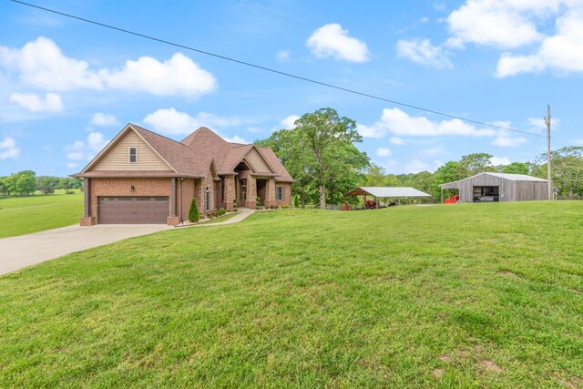 532 Tidwell Rd, Bon Aqua, TN 37025 - view of front of property with brick siding, a front lawn, driveway, and a pole building