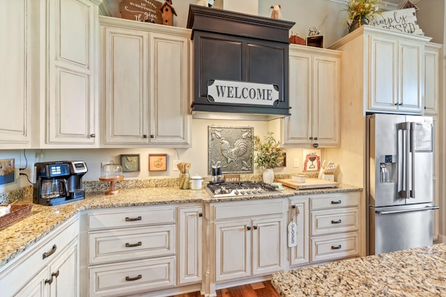 532 Tidwell Rd, Bon Aqua, TN 37025 - kitchen with appliances with stainless steel finishes and light stone counters