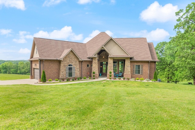 532 Tidwell Rd, Bon Aqua, TN 37025 - view of front of house featuring a front lawn, driveway, a garage, roof with shingles, and brick siding