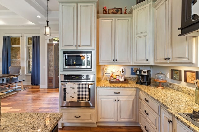 532 Tidwell Rd, Bon Aqua, TN 37025 - kitchen featuring stainless steel appliances, ornamental molding, light wood-style flooring, hanging light fixtures, and light stone counters