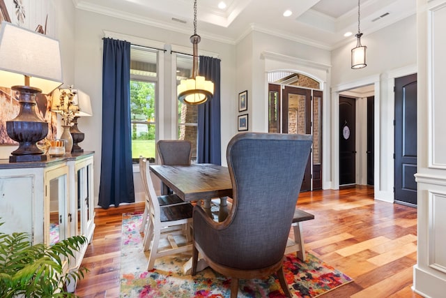 532 Tidwell Rd, Bon Aqua, TN 37025 - dining space featuring light wood finished floors, a chandelier, recessed lighting, and crown molding