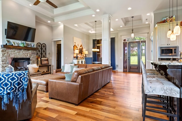 532 Tidwell Rd, Bon Aqua, TN 37025 - living area with light wood finished floors, a fireplace, ornamental molding, recessed lighting, and a ceiling fan