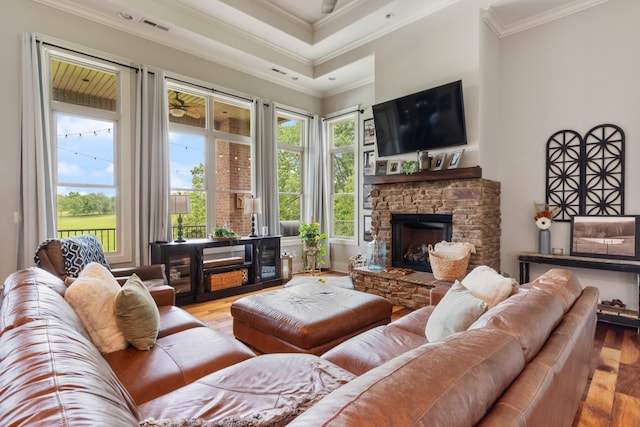 532 Tidwell Rd, Bon Aqua, TN 37025 - living room featuring wood finished floors, ornamental molding, and a fireplace
