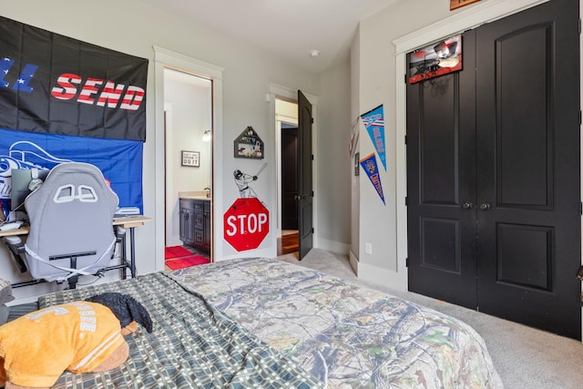 532 Tidwell Rd, Bon Aqua, TN 37025 - carpeted bedroom with a closet, baseboards, and ensuite bath