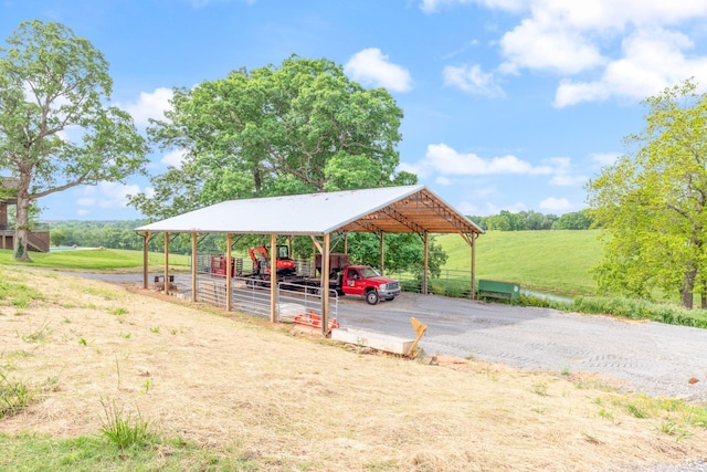 532 Tidwell Rd, Bon Aqua, TN 37025 - view of car parking featuring driveway and a detached carport