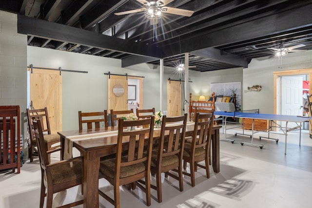 532 Tidwell Rd, Bon Aqua, TN 37025 - dining room with a barn door, ceiling fan, and tile patterned floors