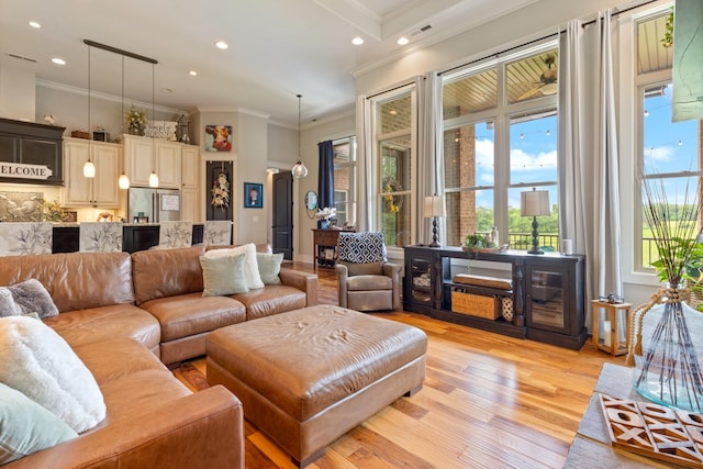 532 Tidwell Rd, Bon Aqua, TN 37025 - living area featuring light wood-style floors, ornamental molding, and recessed lighting
