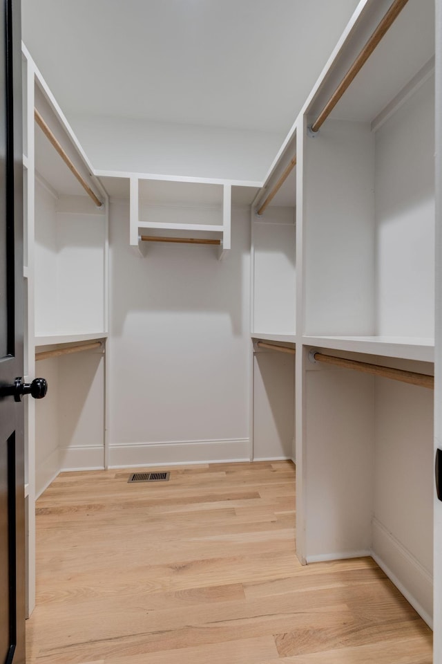 1050 Garton Rd, Burns, TN 37029 - spacious closet with light wood-style flooring