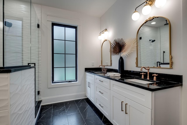 1050 Garton Rd, Burns, TN 37029 - bathroom featuring baseboards, plenty of natural light, marble finish floors, and double vanity