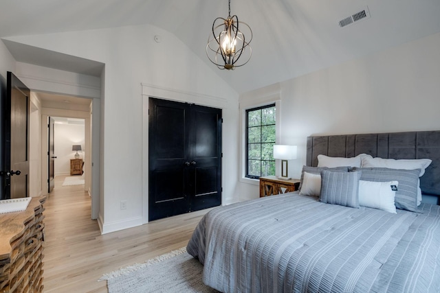 1050 Garton Rd, Burns, TN 37029 - bedroom featuring a chandelier, light wood finished floors, baseboards, and high vaulted ceiling