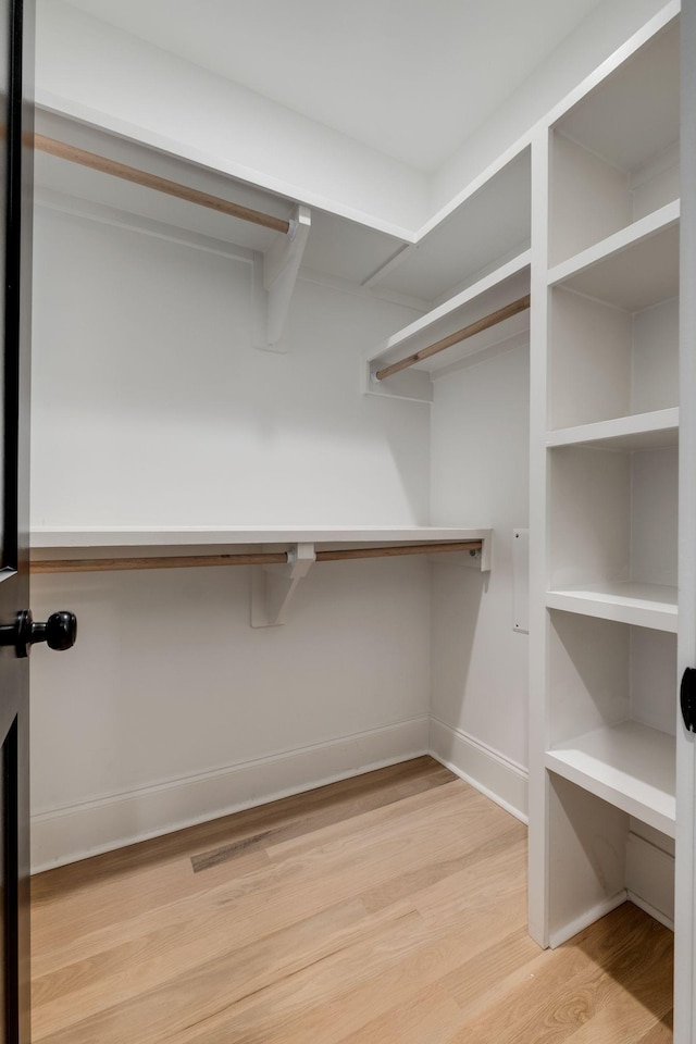 1050 Garton Rd, Burns, TN 37029 - spacious closet with light wood-style flooring
