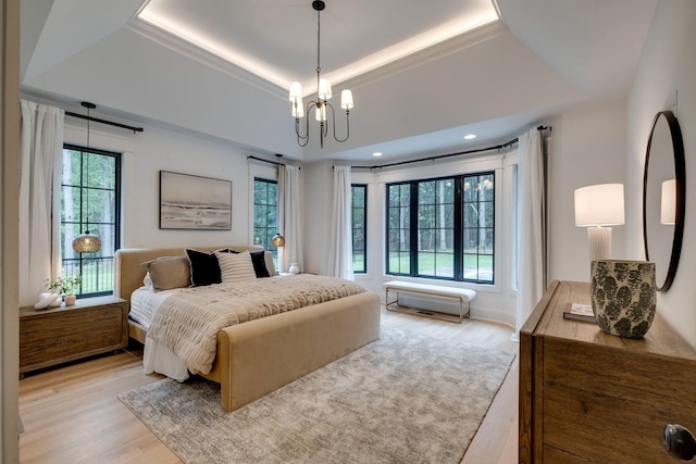 1050 Garton Rd, Burns, TN 37029 - bedroom with light wood-style floors, a chandelier, a raised ceiling, and recessed lighting