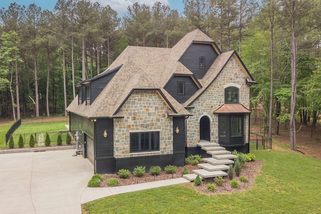 1050 Garton Rd, Burns, TN 37029 - view of front facade featuring stone siding and driveway