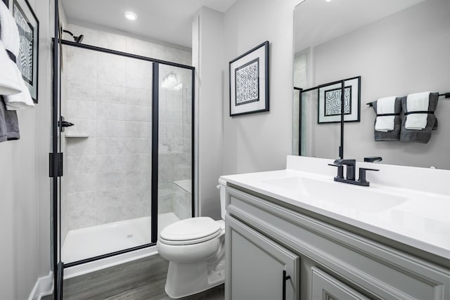 184 Primrose Ln, Gallatin, TN 37066 - full bathroom with toilet, vanity, wood finished floors, a stall shower, and recessed lighting