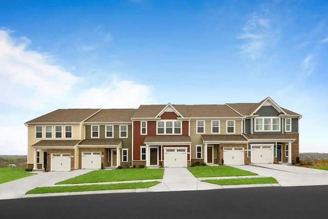 184 Primrose Ln, Gallatin, TN 37066 - townhome / multi-family property featuring driveway, a garage, and a front lawn
