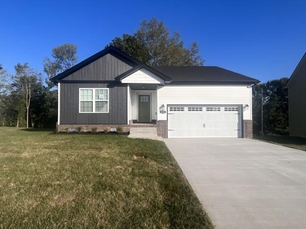 1040 Dublin Dr, Clarksville, TN 37042 - view of front of home featuring an attached garage, driveway, a front yard, and crawl space