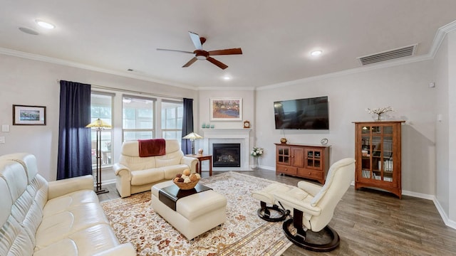1106 Davidson Walk, Spring Hill, TN 37174 - living area featuring baseboards, a ceiling fan, crown molding, wood finished floors, and a fireplace with flush hearth