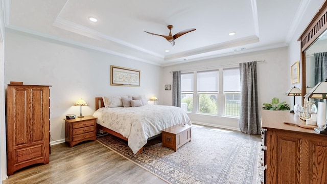 1106 Davidson Walk, Spring Hill, TN 37174 - bedroom featuring a tray ceiling, light wood-style flooring, ornamental molding, recessed lighting, and baseboards