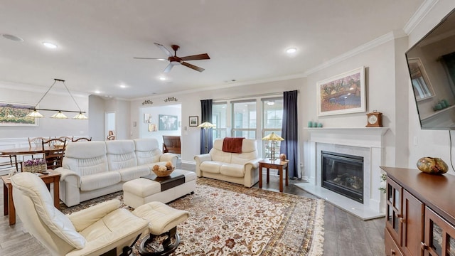 1106 Davidson Walk, Spring Hill, TN 37174 - living area with wood finished floors, a fireplace, crown molding, a ceiling fan, and recessed lighting