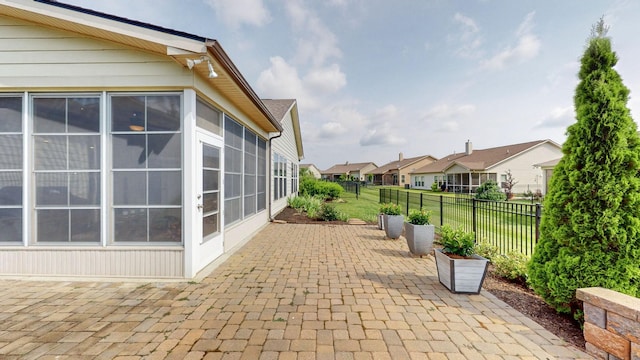 1106 Davidson Walk, Spring Hill, TN 37174 - view of patio / terrace featuring a residential view and a sunroom