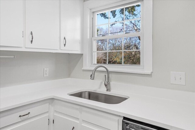 1115 Grantland Ave, Murfreesboro, TN 37129 - kitchen with a sink, white cabinets, light countertops, and dishwashing machine