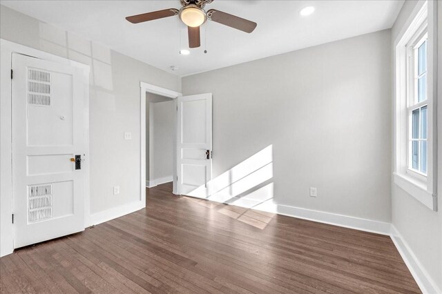 1115 Grantland Ave, Murfreesboro, TN 37129 - unfurnished bedroom with multiple windows, wood finished floors, baseboards, recessed lighting, and ceiling fan