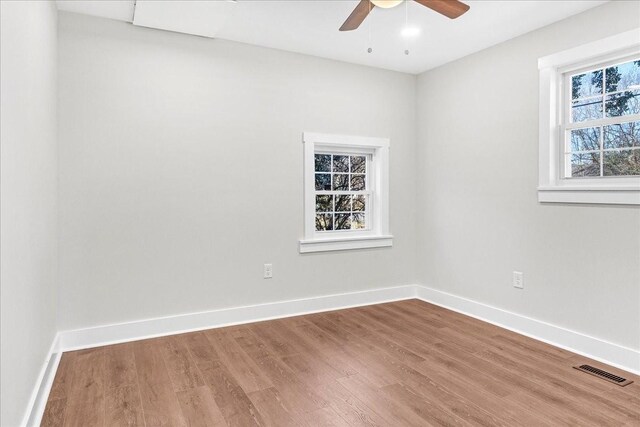 1115 Grantland Ave, Murfreesboro, TN 37129 - spare room featuring wood finished floors, ceiling fan, and baseboards