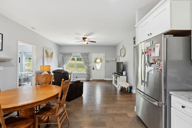 1505 Bakers Work Rd, Burns, TN 37029 - dining room with a ceiling fan, dark wood-style flooring, and baseboards