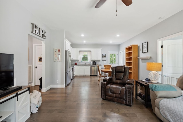 1505 Bakers Work Rd, Burns, TN 37029 - living room featuring dark wood finished floors, ceiling fan, recessed lighting, and baseboards