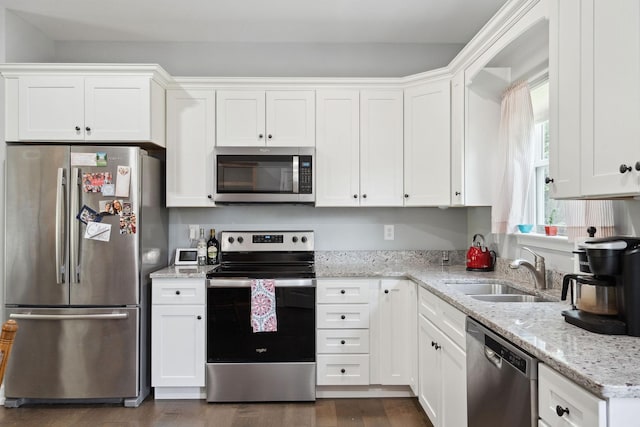 1505 Bakers Work Rd, Burns, TN 37029 - kitchen with appliances with stainless steel finishes, a sink, white cabinetry, and dark wood-style flooring
