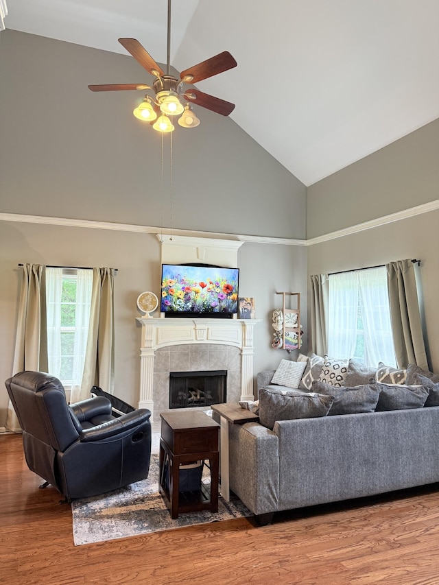 2415 Saint Andrews Dr, Murfreesboro, TN 37128 - living room featuring high vaulted ceiling, ceiling fan, wood finished floors, and a tile fireplace