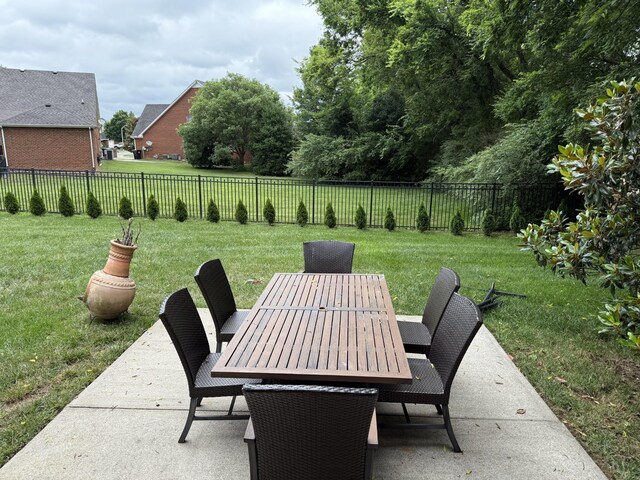 2415 Saint Andrews Dr, Murfreesboro, TN 37128 - fenced backyard with outdoor dining space and a patio