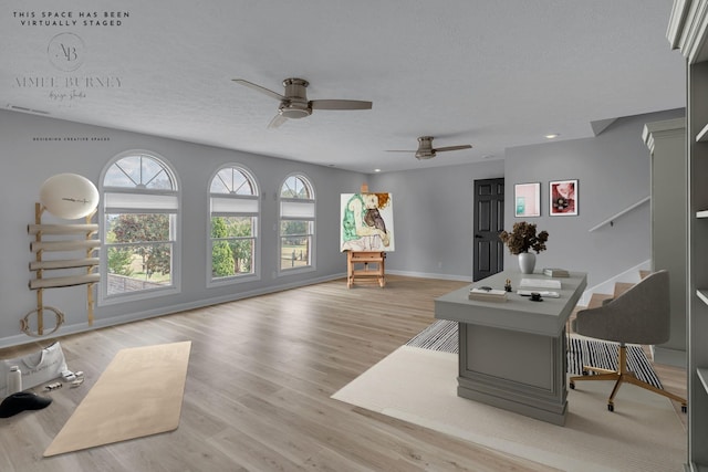 2103 Liebengood Rd, Goodlettsville, TN 37072 - living area featuring a ceiling fan, a textured ceiling, light wood finished floors, baseboards, and recessed lighting