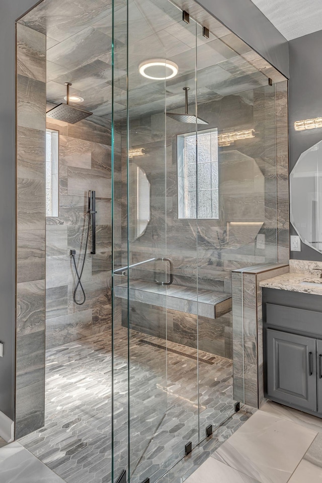 2103 Liebengood Rd, Goodlettsville, TN 37072 - bathroom with a shower stall, vanity, and marble finish flooring