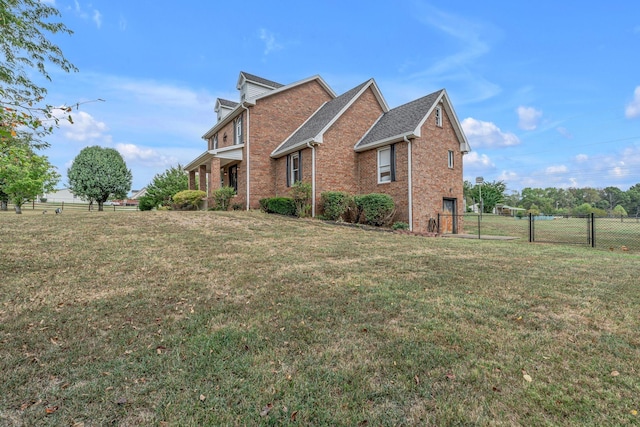 2103 Liebengood Rd, Goodlettsville, TN 37072 - view of side of home featuring brick siding and a gate