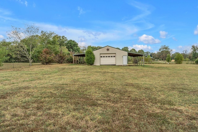 2103 Liebengood Rd, Goodlettsville, TN 37072 - view of grassy yard with a garage, an outdoor structure, and an outbuilding