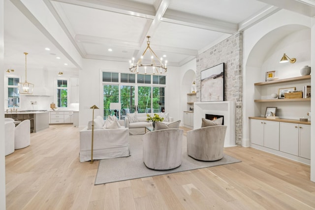 9314 Double Run Ct, College Grove, TN 37046 - living area with light wood finished floors, a chandelier, a fireplace, recessed lighting, and beam ceiling